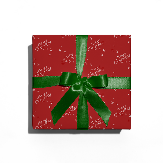 Red gift box with green ribbon on a white background