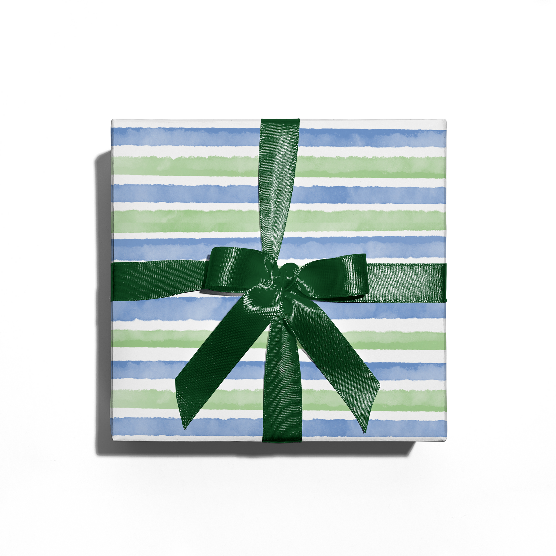 gift box with watercolor stripes wrapping paper and green bow