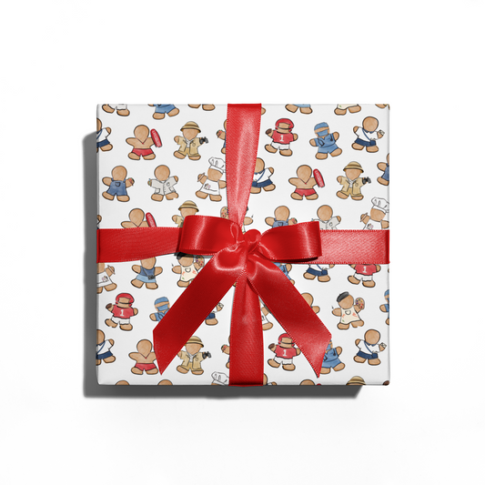 Gift box with gingerbread man pattern and red ribbon on a white background
